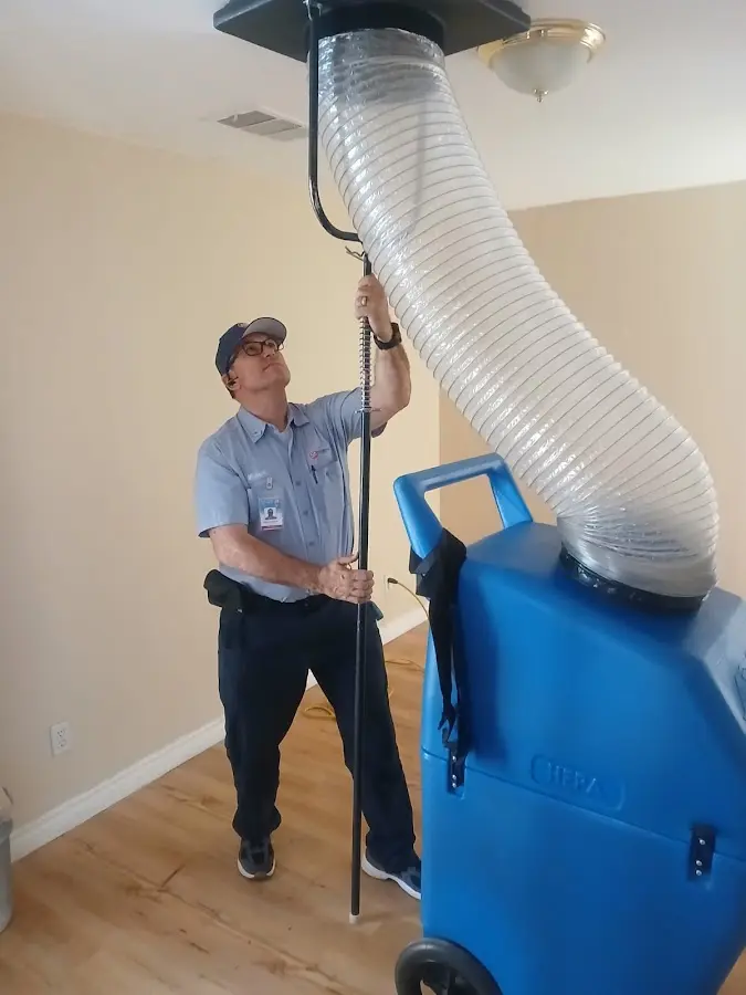 HVAC Installation technician using HEPA equipment in Amelia